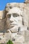 Closeup of Abraham Lincoln. Presidential sculpture at Mount Rushmore National Monument, South Dakota, USA.