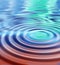 Closeup of abstract ripple effect of water with blue reflection with wave pattern and texture. Detail of hypnotizing