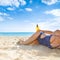 Closeup on active woman in swimwear on seashore with sun cream