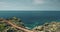 Closeup aerial view of bridge at limpid lake on green cliff ocean shore. Epic Indonesian landscape