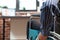 Closeup of african american employee living with disability standing in wheelchair in front of desk