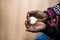 Closeup of African-American girl holding a marble made heart shape in her hands