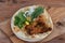 Closeup of a Al Faham Chicken on a chapati bread