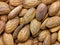 Closeup almonds heap background