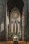 Closeup altar and stained glass behind it in side room in St. Marys Cathedral