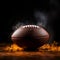 Closeup an American football ball shrouded in dramatic smoke