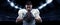 Closeup american football player in sports equipment grips the ball tightly against night stadium with spotlights