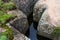 Closeup of ancient Aztec stones with engravings on them in Peru