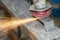 Closeup angle grinder making sparks