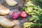 Closeup of antirrhinum, slices of apple and halves of paradise a