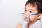 Closeup Asian face, Little children boy sick he using steam inhaler nebulizer mask inhalation oneself