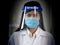 Closeup asian female doctor wears face shield and mask