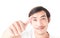 Closeup asian young man showing thumbs up with white background, excellent symbol