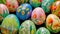 Closeup of assorted vibrant painted eggs, AI-generated.