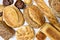 Closeup of an assortment of freshly baked bread on a marble table