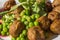 Closeup Authentic Juicy Swedish Meatballs Brown Gravy Lingonberry Mashed Potatoes Green Peas