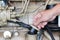 Closeup of an auto mechanic working on a Generator