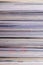 Closeup background of a pile of magazines