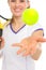 Closeup on ball throwing up by tennis player