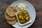 Closeup of Banarasi Aloo sabzi and Kachori with Dahi Mattha Kalyan