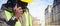 closeup banner of black man civil engineer at construction site talking on phone, copy space