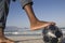 Closeup Of Barefeet With Soccer Ball On Beach