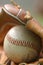 Closeup of a baseball in a glove