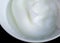 Closeup Beaten Plain Egg Whites in a Mixing Bowl