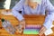 Closeup of beautiful 90 year old woman with pills on table. Elderly woman, with headache, emotional problem, dementia