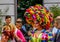 Closeup of a beautiful drag queen in a colorful dress and rainbow wig, Gender diversity, LGBT pride parade antwerp, 10 august,