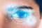 Closeup of beautiful eye woman process scanning with technology, visual hologram, digital display information