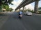 Closeup of Beautiful Wide Bangalore Asphalt Road with Namma Metro Bridge or Flyover in a side near the Goraguntepalya. Due to