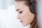 Closeup beautiful woman portrait listening music with headphone closeup