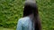 Closeup beautiful young asian woman walking in a garden