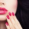 Closeup Beauty Concept with Pink Girls Lips and Hand