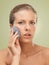 Closeup beauty portrait woman scrubbing her skin