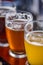 Closeup of a beer flight outside on a sunny day