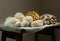 Closeup of Big raw mushrooms on a cloth displayed on a wooden table