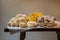 Closeup of Big raw mushrooms on a cloth displayed on a wooden table