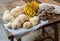 Closeup of Big raw mushrooms on a cloth displayed on a wooden table