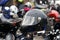 Closeup bkack moto helmet on motorcycle handlebars