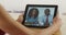 Closeup of black businesspeople talking on tablet