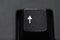 Closeup of a black keyboard arrow button