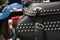 closeup of black leather motorcycle saddle bags with rhinestone studs