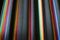 Closeup of black with rainbow stripes fabric