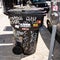 Closeup of a black trash can with graffiti tags in the streets of Los Angeles