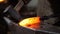 Closeup of Blacksmith Forging Blade of Knife