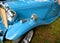 Closeup of a blue classic sports car