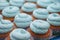 Closeup of blue cupcakes. Selective focus. Sweet dessert tasty food concept muffin baby shower treat.
