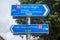 Closeup of blue directional road signs for cyclists to cycle different superhighways in Leeds